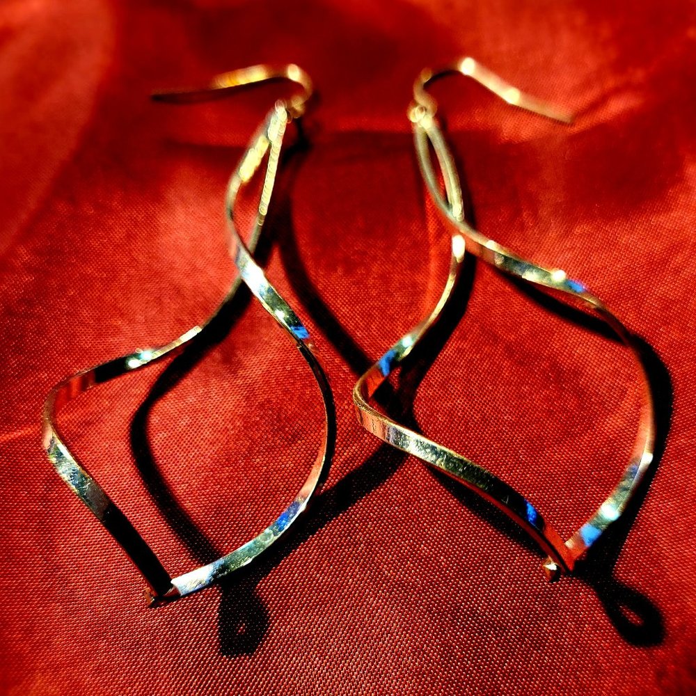 Silver swirl twist drop earrings